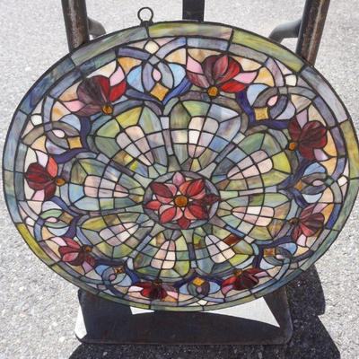 1038	ANTIQUE STAIN GLASS WINDOW IN FRAME, APPROXIMATELY 24 1/2 IN ROUND
