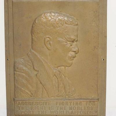 1026	CAST BRONZE PLAQUE THEODORE ROOSEVELT *AGGRESSIVE FIGHTING FOR THE RIGHT IS THE NOBLEST SPORT THE WORLD AFFORDS*, APPROXIMATELY 9...