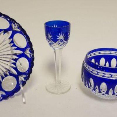 1053	BOHEMIAN GLASS COBALT CUT TO CLEAR 4 PC. ASSORTMENT INCLUDING CORDIALS, SMALL BOWL AND DISH, TALLEST PIECE APPROXIMATELY 5 IN H
