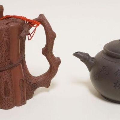1006	2 ASIAN CLAY TERRACOTTA TEA POTS, LARGEST APPROXIMATELY 6 IN H
