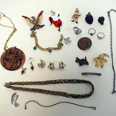 1284	ASSORTED JEWELRY INCLUDING NECKLACES, PINS AND MORE
