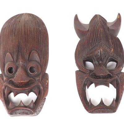 Two Wood Carved Tibetan Transformation Masks