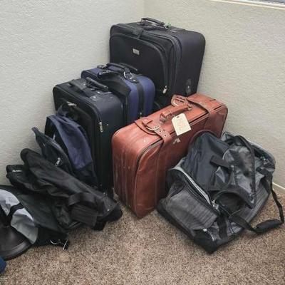 #1402 â€¢ Backpack, Duffel Bags, Suitcases, and Jafra Bags

