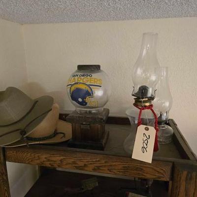 #2506 â€¢ (2) Kerosene Lamps, (2) Cowboy Hats, and Vintage Candy Jar
