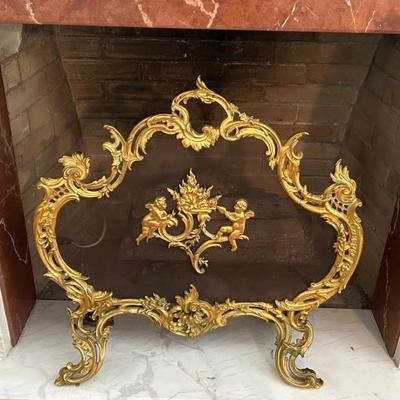 Stunning bronze fireplace screen. 