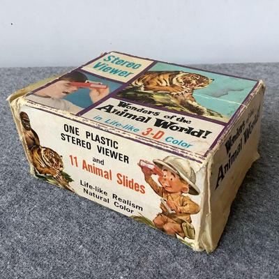 Vintage stereo viewer with animal slides