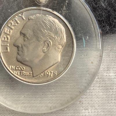 1975 Roosevelt Dime, no mint encased in acrylic