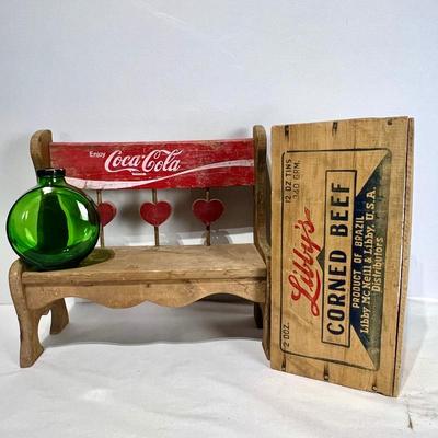 Vintage Advertising Collectibles Lot - Coca-Cola Bench, Libby's Corned Beef Crate, and Sunsweet Green Glass Flask