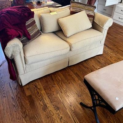 Pair of matching gold loveseats 