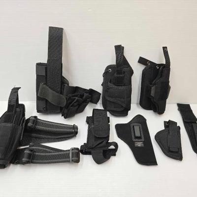 #1960 â€¢ (8) Firearm and Ammo Holsters and Pouches
