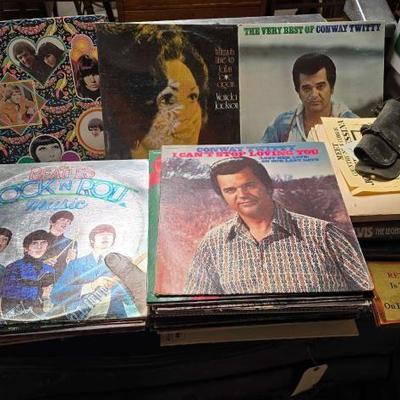 #2176 â€¢ (50+) Vinyl Records, (4) Books, Flyers and More
