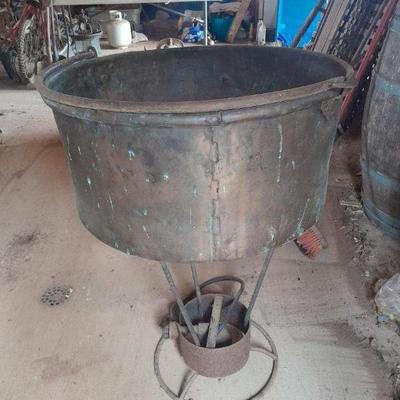 Copper pot on stand
