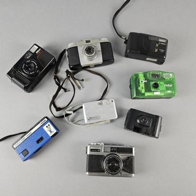 Lot 242 | Vintage Cameras & Disposables Lot