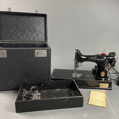 Lot 295 | Vintage Portable Singer Sewing Machine