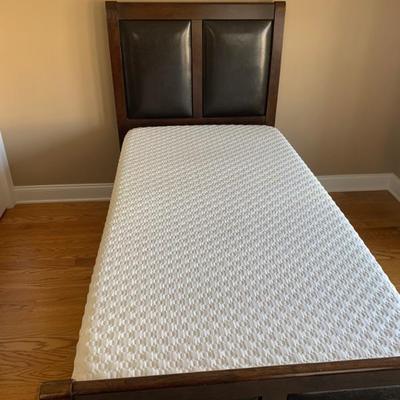 Twin-size bed with mattress
