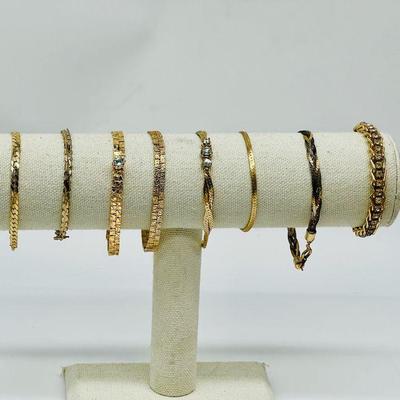 (8) Golden Bracelets
