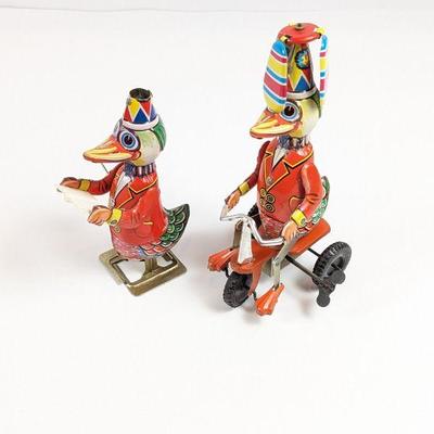 Vintage Tin Toys Duck on a Bike and Dr Duck