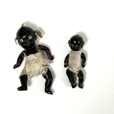 Two Antique Bisque Black Baby Dolls with String Jointed Limbs