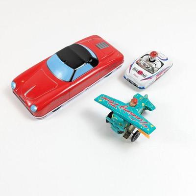 Vintage Shell & Martini Pull Back Race Car, Training Plane Wind Up Tin Toy, & Porsche Speedster Tin Pencil Case