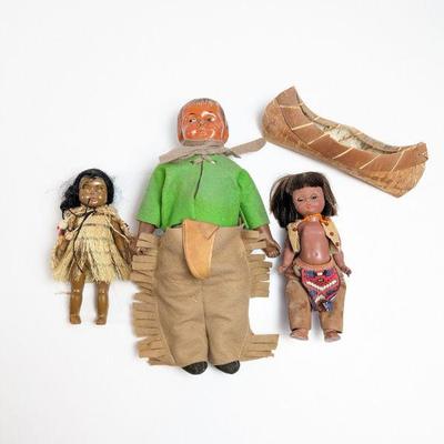 Two Native American Dolls (including Madame Alexander doll), One Maori Doll and One Wood Bark Canoe