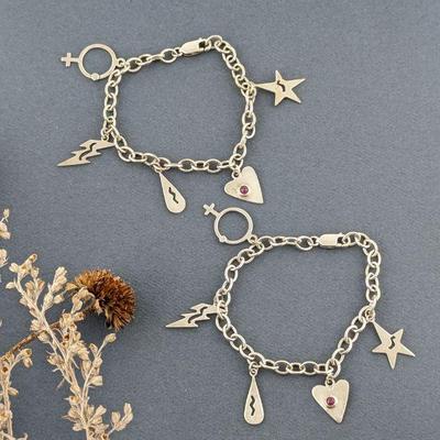 Two Identical Sterling Silver Charm Bracelets with Ruby