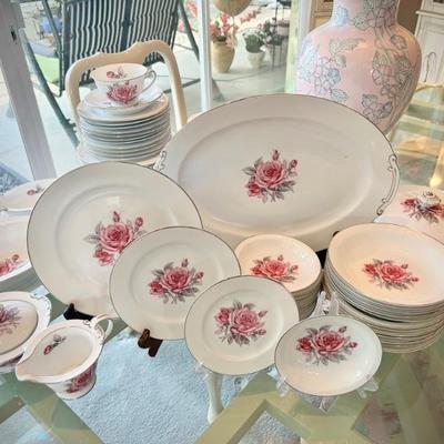 Set of Peari Fine China with rose pattern from Japan. Includes dinner, salad, bread & butter dishes; soup and fruit bowls; coffee cups &...
