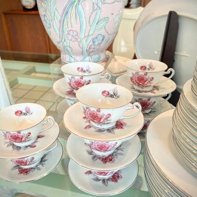 Set of Peari Fine China with rose pattern from Japan. Includes dinner, salad, bread & butter dishes; soup and fruit bowls; coffee cups &...
