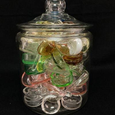 DILA115 Glass Jar Filled With Glass Spoon Collection	Too many to count, all glass. Several possible uranium glass.Â 
