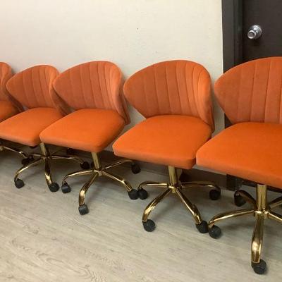 DILA804 70's Orange, Rolling Chairs	Set of five vintage style rolling chairs. Adjustable height, seats measure 16