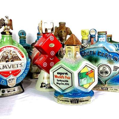 CT909 Vintage Jim Beam Decanter Collection	14 collectible bourbon whiskey bottles.
