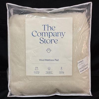 DILA111 The Company Store Wool Mattress Pad	New, never used, full size, made from Australian wool. Bag is opened. Measures 54 x 75
