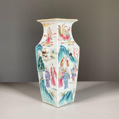 FAMILLE ROSE PORCELAIN SQUARE VASE | Showing procession of figures offering gifts to a dignitary with gods depicted in clouds, applied fu...