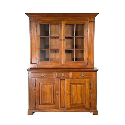 CENTURY FURNITURE BOOKCASE / CUPBOARD | 20th century, having double glazed doors over three drawers, over double cabinet doors, with...