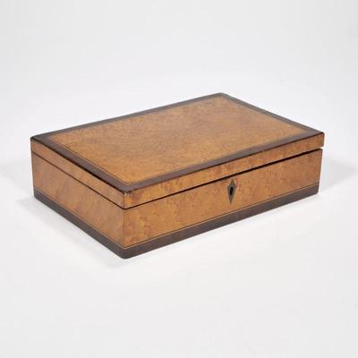 INLAID BIRDS EYE JEWELRY BOX | 19th/20th century bird's eye maple and inlaid in contrasting woods; fitted with a tiger maple interior. -...