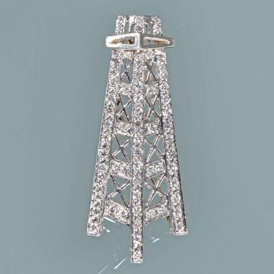 DIAMOND & PLATINUM OIL DERRICK PENDANT / PIN | Designed as a finely detailed oil derrick mounting melee diamonds with a pin back and...