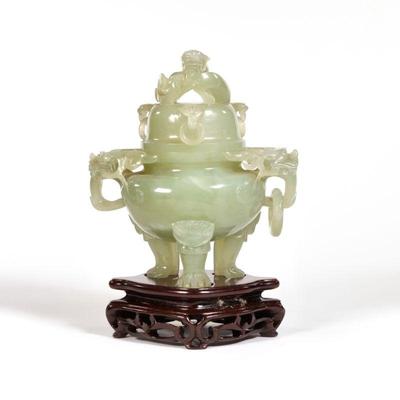 CHINESE CARVED JADE CENSER | Lid with a sinuous dragon and three mounts with carved rings, the censer with two foo dogs and reticulated...