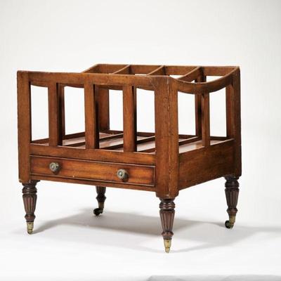 ANTIQUE WOOD CANTERBURY | Having four equal partitions with curved top over a full-width drawer with round brass pulls and cockbeading,...
