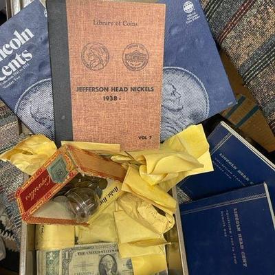 Strong box Currency, Two dollar bills, Silver Certificates with blue seal, Weaties pennies, Jefferson Head Nickels, books of coins....