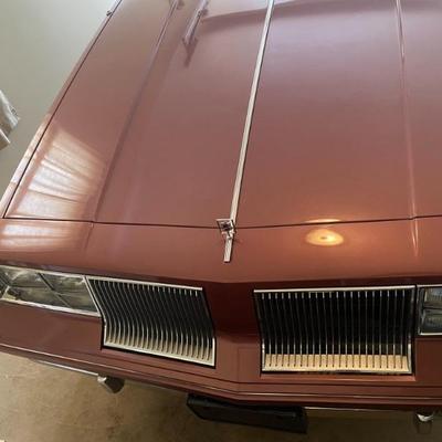 See bidding instructions on this site under TERMS  this is the 1986 Oldsmobile Cutlass Supreme V8 with 3,664 original miles