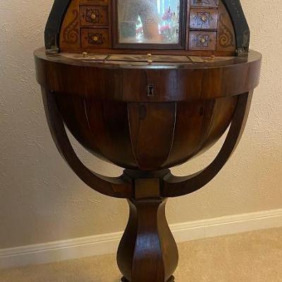 Globe shaped sewing stand, built by craftsmen very unusual