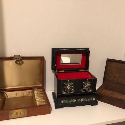 Antique jewelry boxes (brown wood and decorative black) $5 each; Plain Wooden Box $2