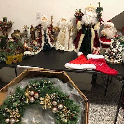 Christmas table: Prices vary! Santa's $10 each;  set of two large hanging wreaths$30; Santa Sleigh $20  Light up Bichon tree $35; All...