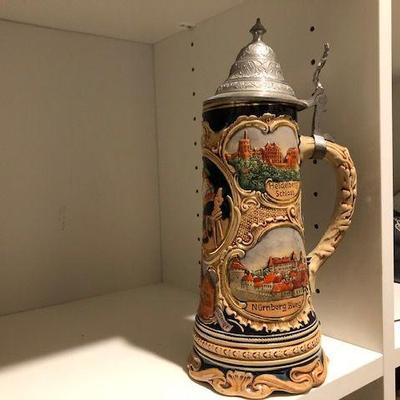 Tall German Relief Molded Stein; beautiful decorative art; music wind up on bottom is not functioning, very old family history piece; $30