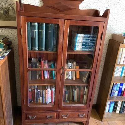 Antique cherry 2-door bookcase with paneled sides, total height 66 in., width 36 in. depth 14 in.