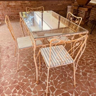 Vintage glass top porch table