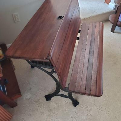 ANTIQUE 2 SEATER SCHOOL DESK, HAS BEEN REFINISHED, IRON BASE