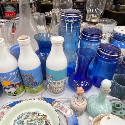 Misc colored glass:  milk bottles, vases, storage bottles