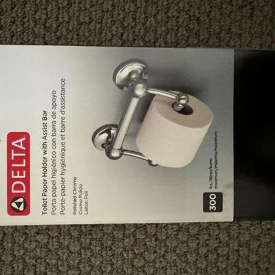 Delta safety grab bar toilet paper holder. Brand new