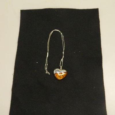 Silver necklace with amber pendant