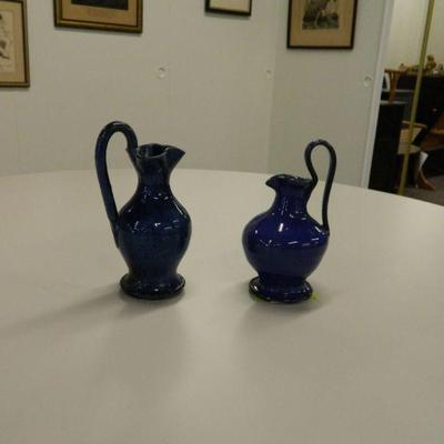Two Rebecca pitchers one signed J.B. Cole and other Cole Pottery